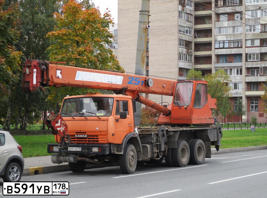 Фото автомобиля KAMAZ 65115 /6X4/, 2011 — госномер В591УВ178. Цвет: ОРАНЖЕВЫЙ