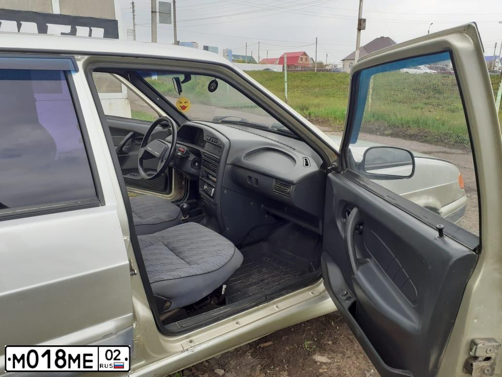 Фото автомобиля LADA 2115 SAMARA, 2006 — госномер М018МЕ02. Цвет: СЕРЕБРИСТО-БЕЖЕВЫЙ