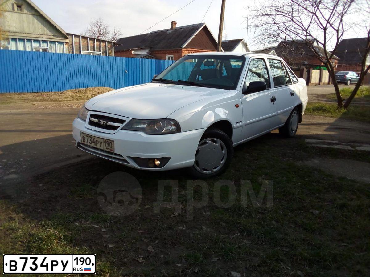 Фото автомобиля DAEWOO NEXIA, 2011 — госномер О863АС550. Цвет: Белый