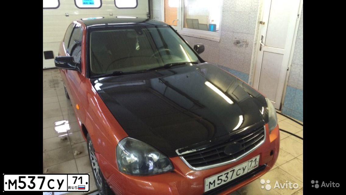 Фото автомобиля LADA 2172 PRIORA, 2011 — госномер Е233НМ164. Цвет: Оранжевый