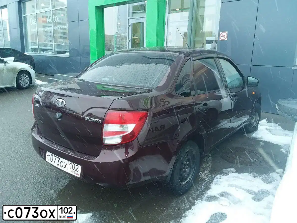 Фото автомобиля LADA 2190 GRANTA, 2016 — госномер Н990АА716. Цвет: ТЕМНО-ВИШНЕВЫЙ