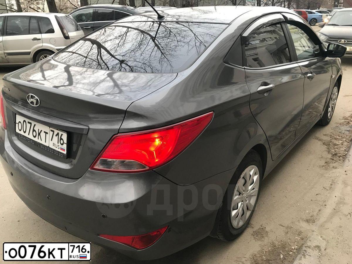 Фото автомобиля HYUNDAI SOLARIS, 2016 — госномер М166ТМ777. Цвет: ТЕМНО-СЕРЫЙ