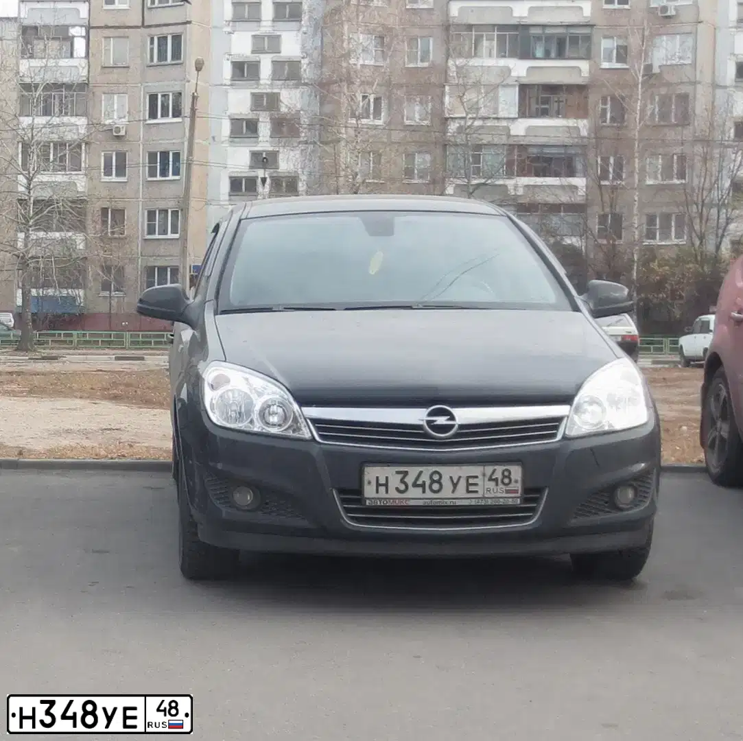 Фото автомобиля OPEL ASTRA, 2012 — госномер Н348УЕ48. Цвет: ЧЕРНЫЙ