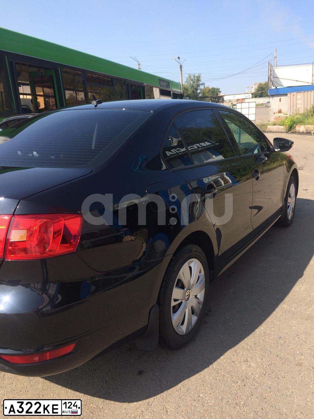 Фото автомобиля VOLKSWAGEN JETTA, 2012 — госномер Е919СХ124. Цвет: ЧЕРНЫЙ