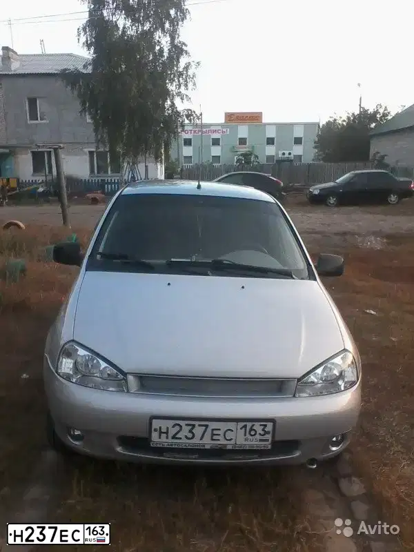 Фото автомобиля LADA 1117 KALINA, 2011 — госномер Н237ЕС163. Цвет: СЕРЕБРИСТЫЙ