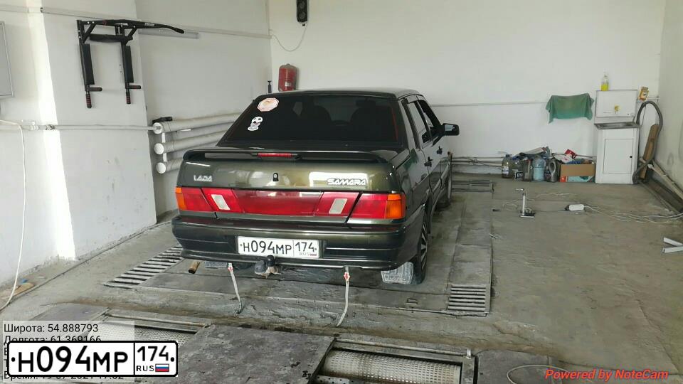 Фото автомобиля LADA 2115 SAMARA, 2006 — госномер Н094МР174. Цвет: Темно-зеленый