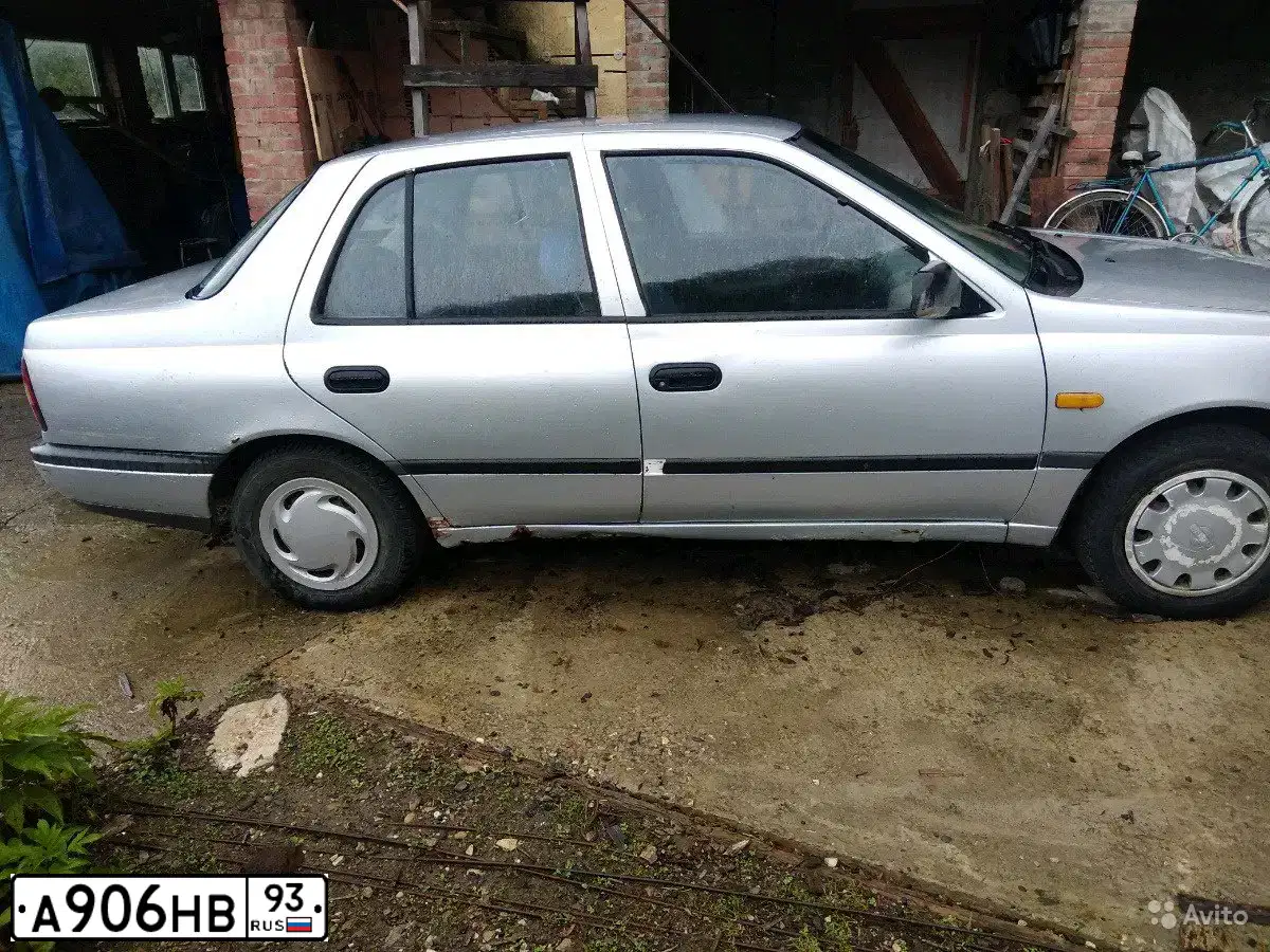 Фото автомобиля NISSAN SUNNY, 1991 — госномер А906НВ93. Цвет: СЕРЕБРИСТЫЙ