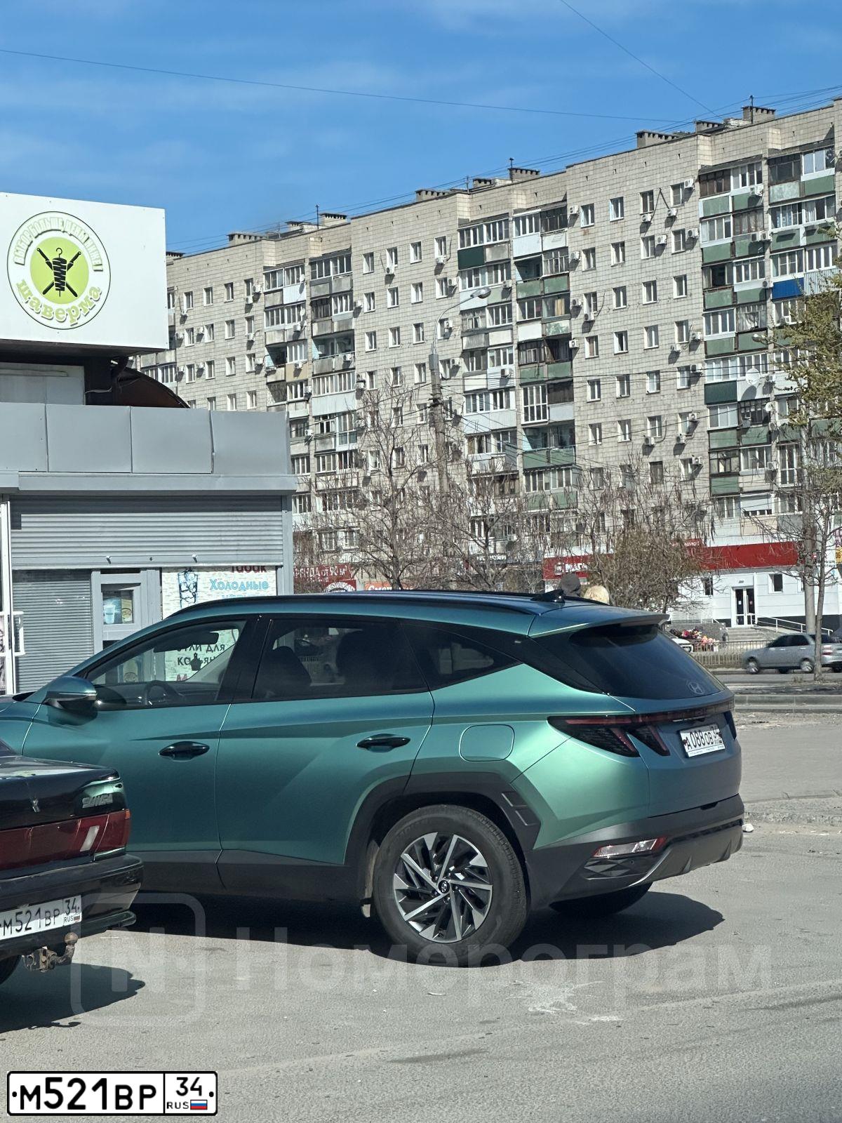 Фото автомобиля LADA 2115 SAMARA, 2008 — госномер М521ВР34. Цвет: ТЕМНО ЗЕЛЕНЫЙ