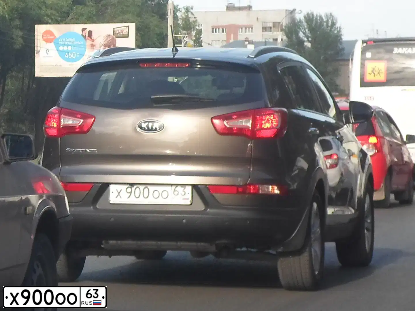 Фото автомобиля KIA SPORTAGE, 2011 — госномер Х900ОО63. Цвет: КОРИЧНЕВЫЙ