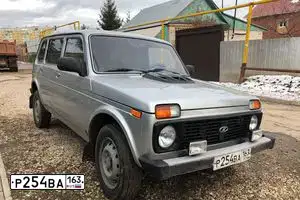Фото автомобиля LADA 2131 NIVA, 2011 — госномер Р254ВА163. Цвет: Светло-Серебристый металлик