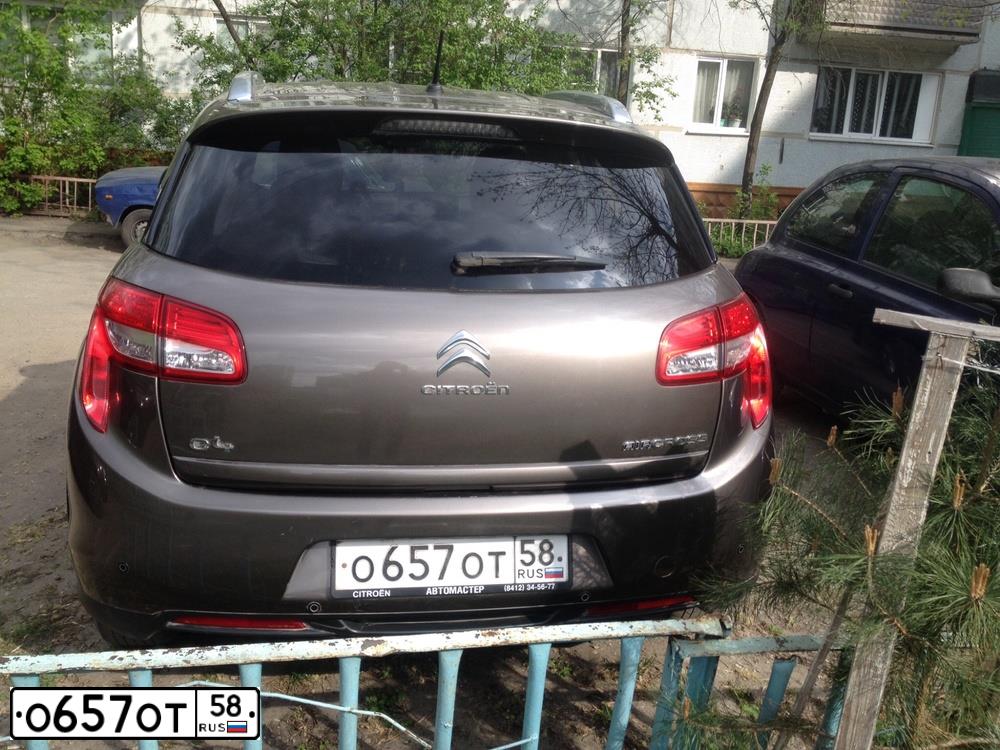 Фото автомобиля CITROEN C4, 2012 — госномер Т031НК58. Цвет: Коричневый