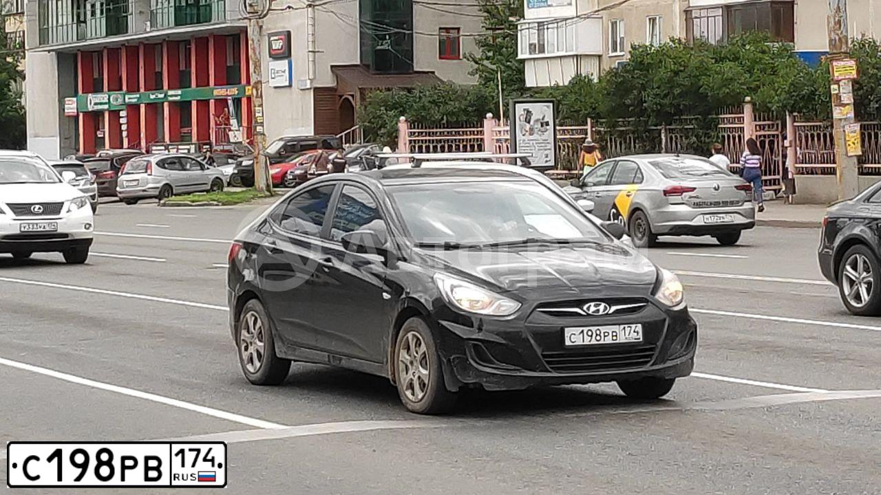 Фото автомобиля HYUNDAI SOLARIS, 2012 — госномер С198РВ174. Цвет: ЧЕРНЫЙ