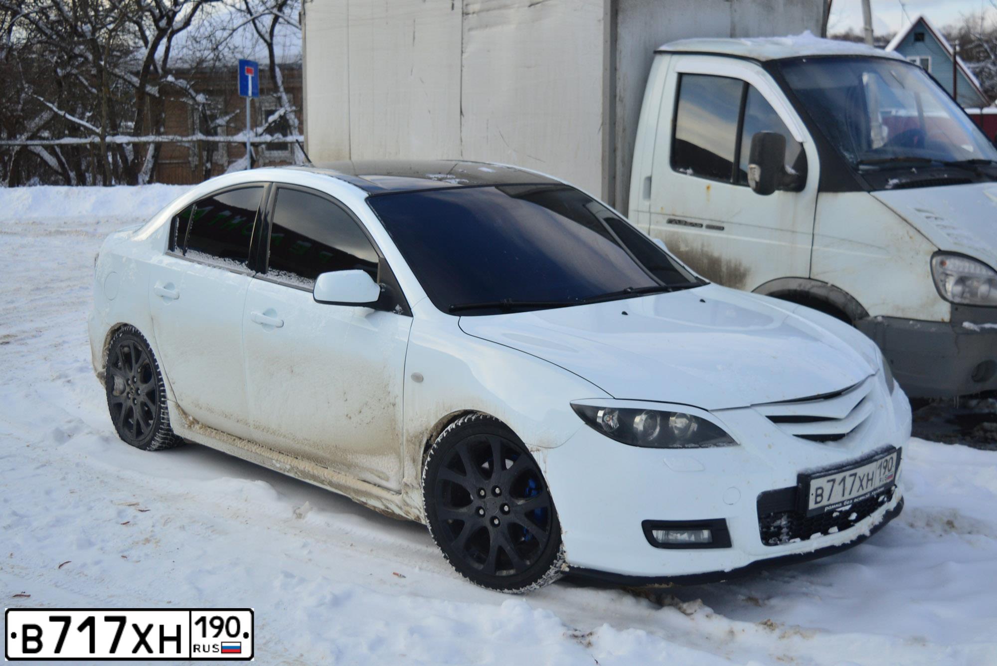 Фото автомобиля MAZDA 3, 2007 — госномер К906КС53. Цвет: БЕЛЫЙ-ЧЕРНЫЙ
