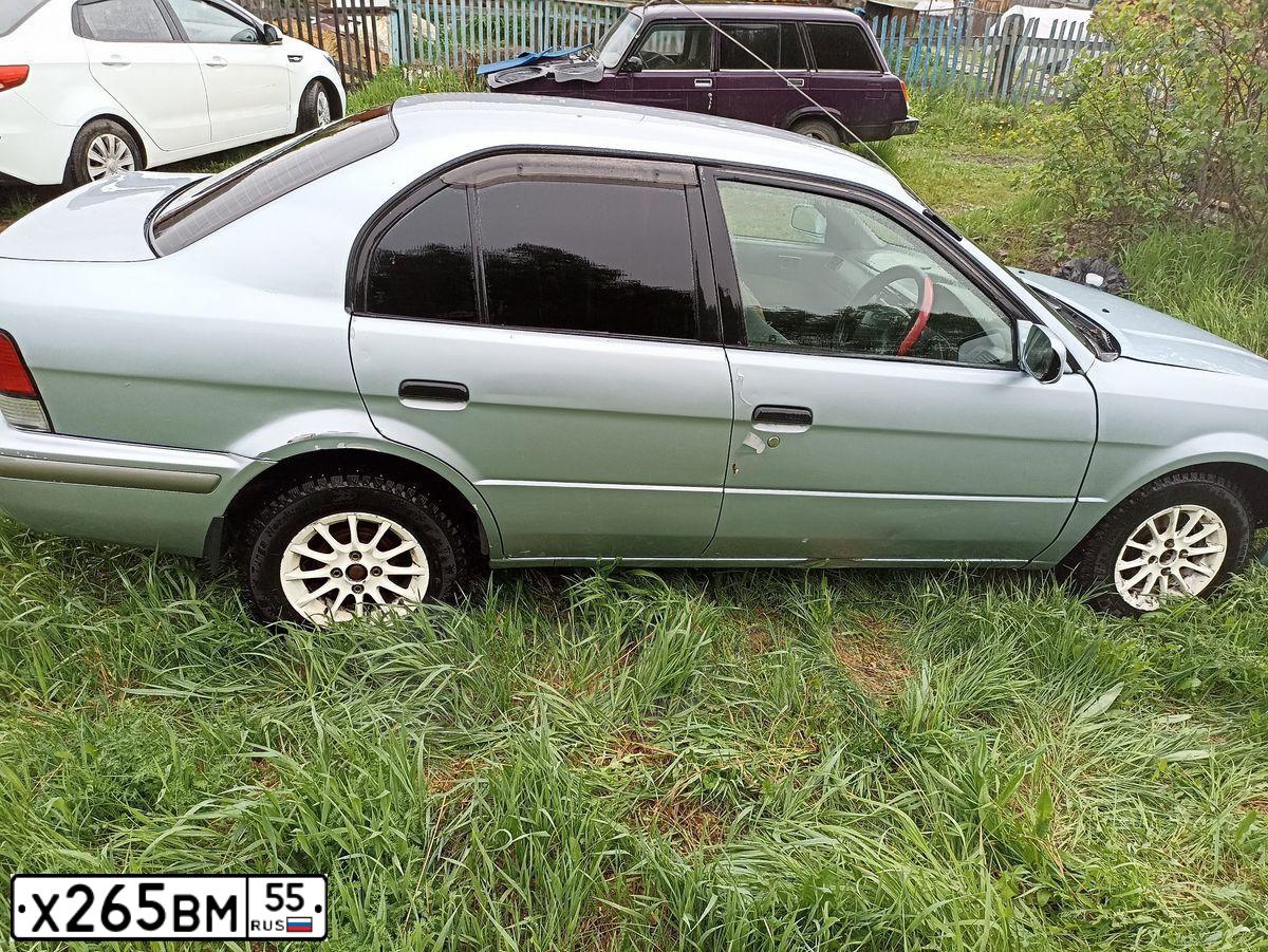 Фото автомобиля TOYOTA CORSA, 1999 — госномер А980АУ155