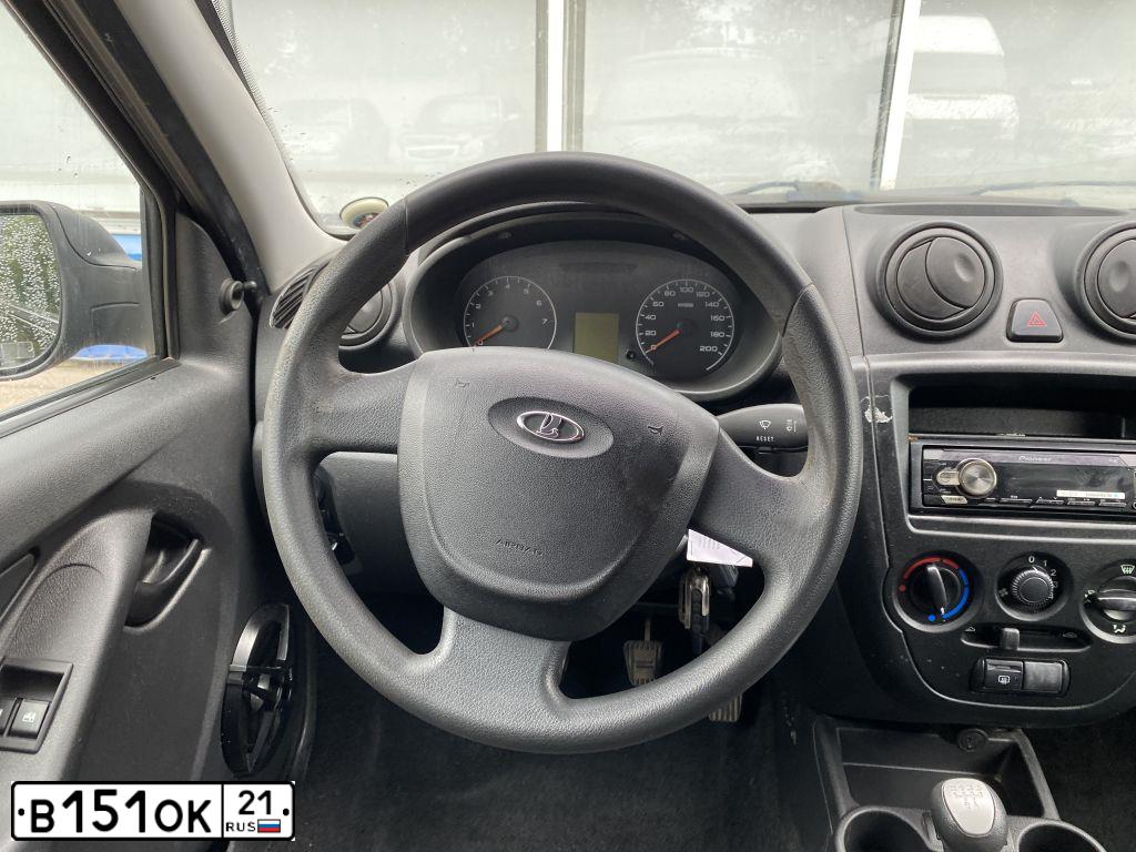 Фото автомобиля LADA GRANTA, 2012 — госномер Н829ТА15. Цвет: СИНЕ-ЧЕРНЫЙ