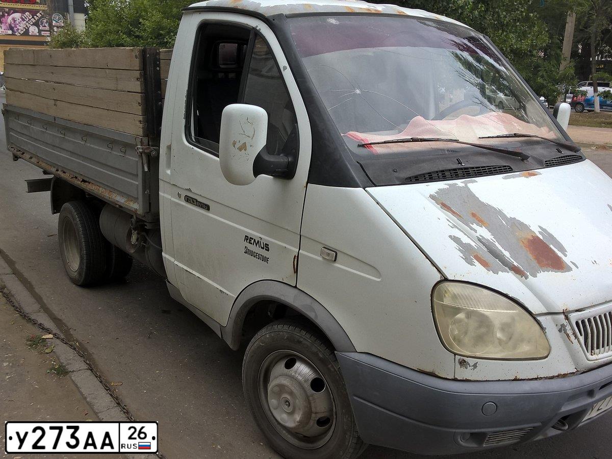 Фото автомобиля GAZ 3302 GAZEL, 2005 — госномер Р142КЕ05. Цвет: БЕЛЫЙ