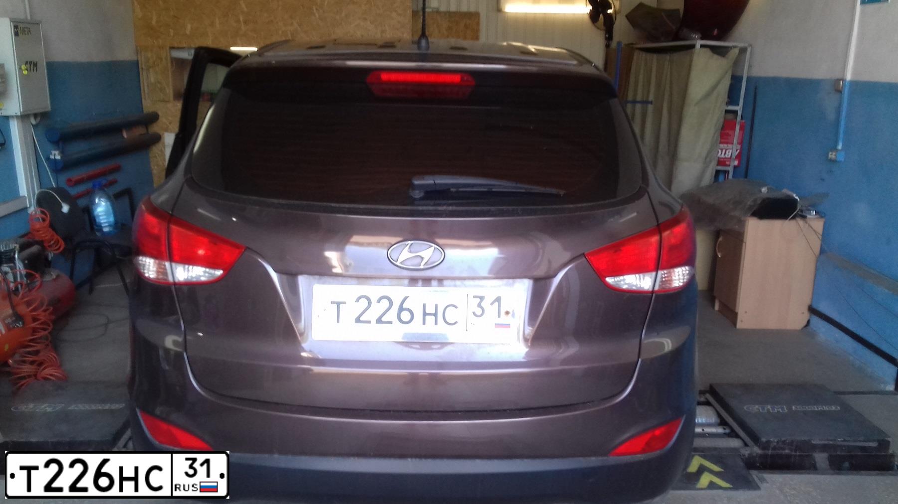 Фото автомобиля HYUNDAI IX35, 2014 — госномер Н553ТР31. Цвет: Коричневый