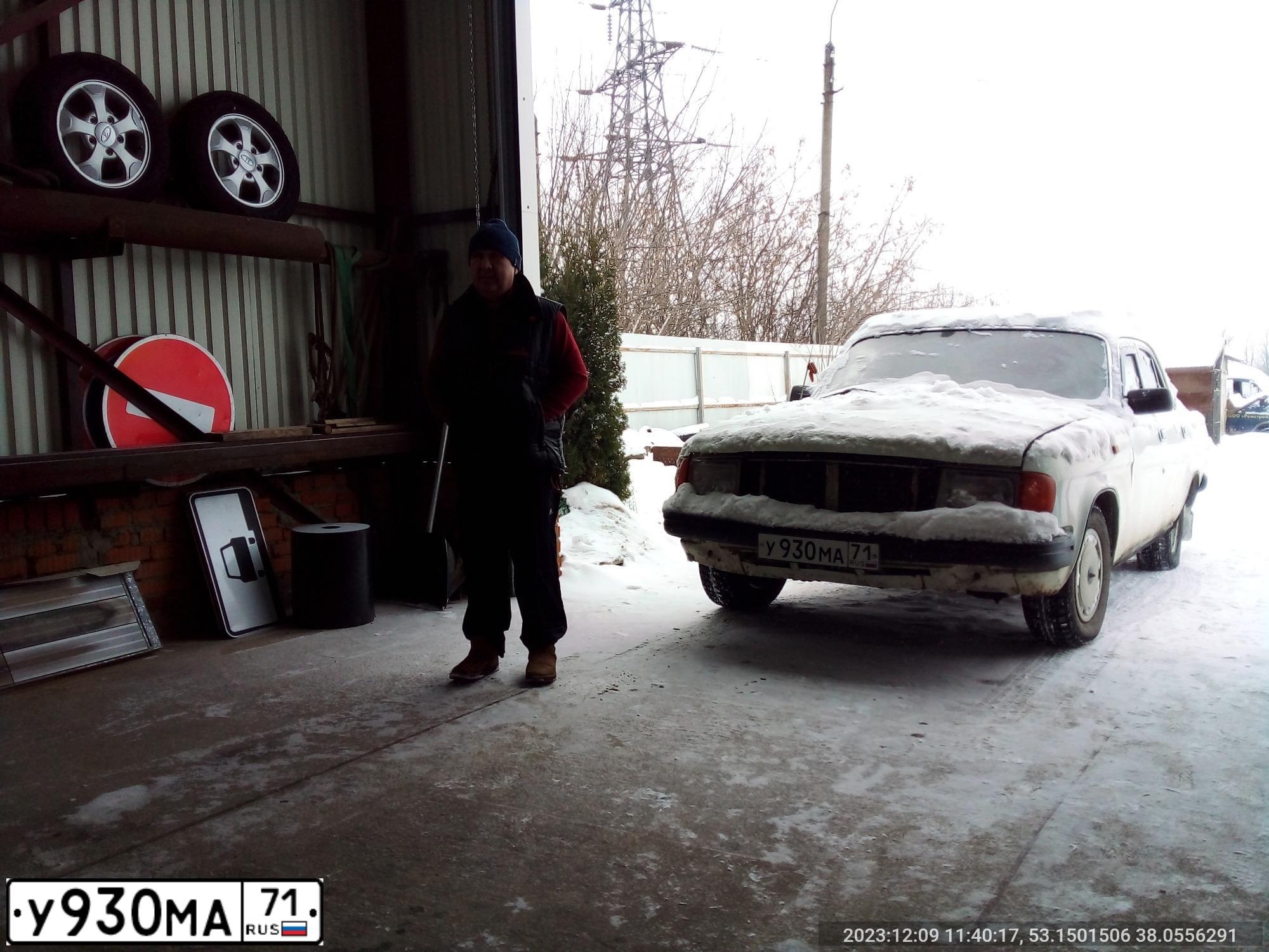 Фото автомобиля GAZ 3102, 1997 — госномер Т010УО198. Цвет: СЕРО-БЕЛЫЙ