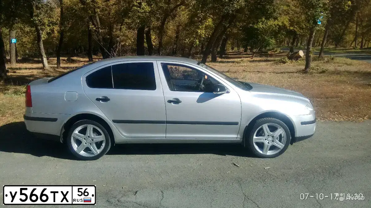 Фото автомобиля SKODA OCTAVIA, 2008 — госномер Е173РН156. Цвет: СЕРЕБРИСТЫЙ