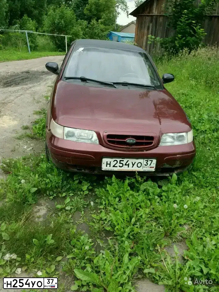Фото автомобиля LADA 2110, 2004 — госномер Н254УО37. Цвет: БОРДОВЫЙ