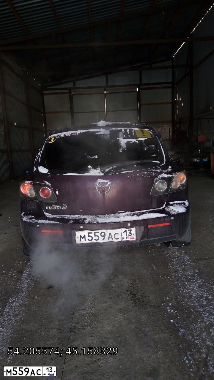 Фото автомобиля MAZDA 3, 2006 — госномер К003ЕН13. Цвет: ТЕМНО-ВИШНЕВЫЙ