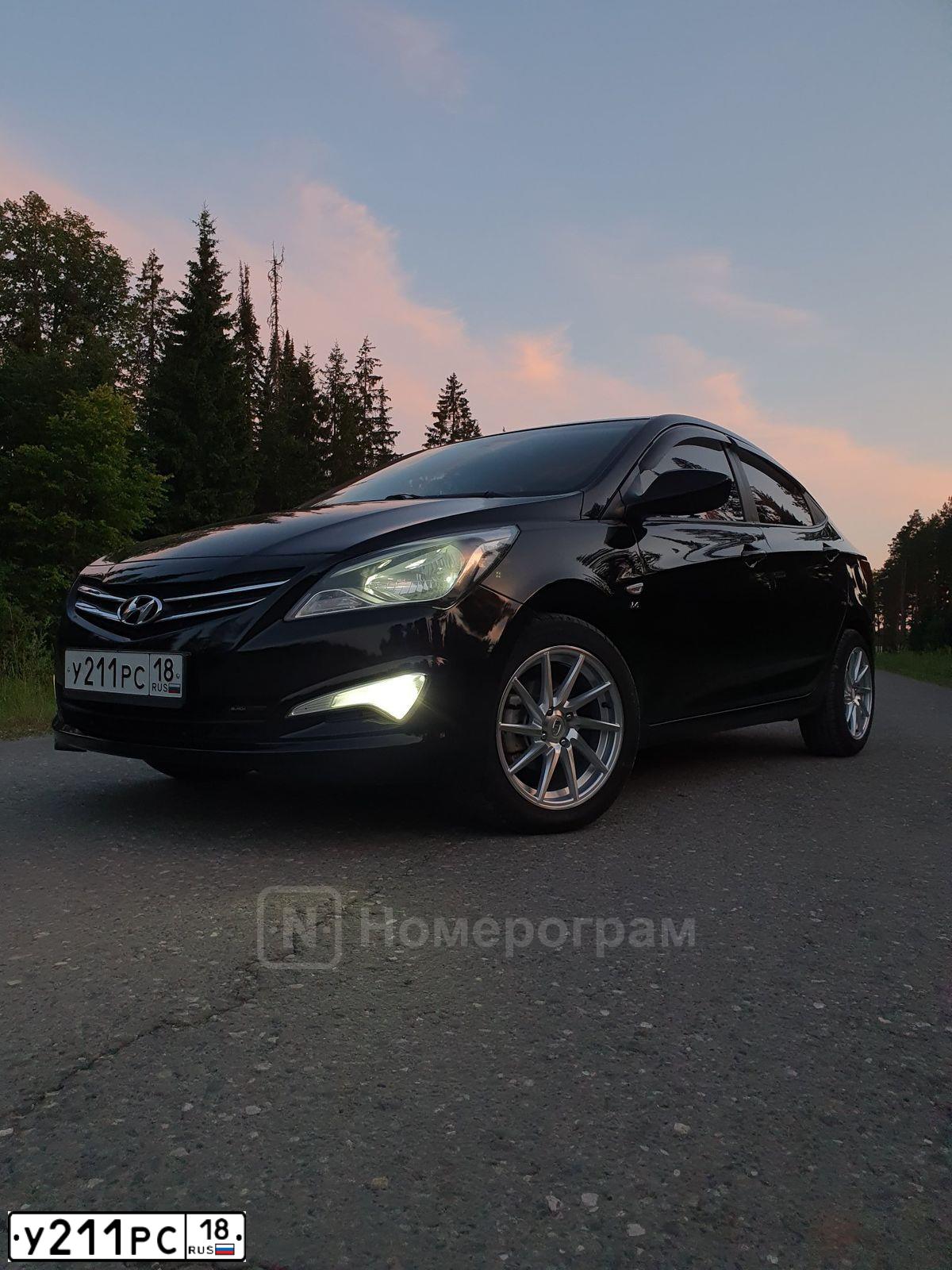 Фото автомобиля HYUNDAI SOLARIS, 2015 — госномер О228РМ777. Цвет: ЧЕРНЫЙ