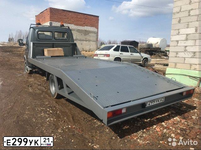 Фото автомобиля GAZ 2705 GAZEL, 2011 — госномер Е299УК21. Цвет: Серый