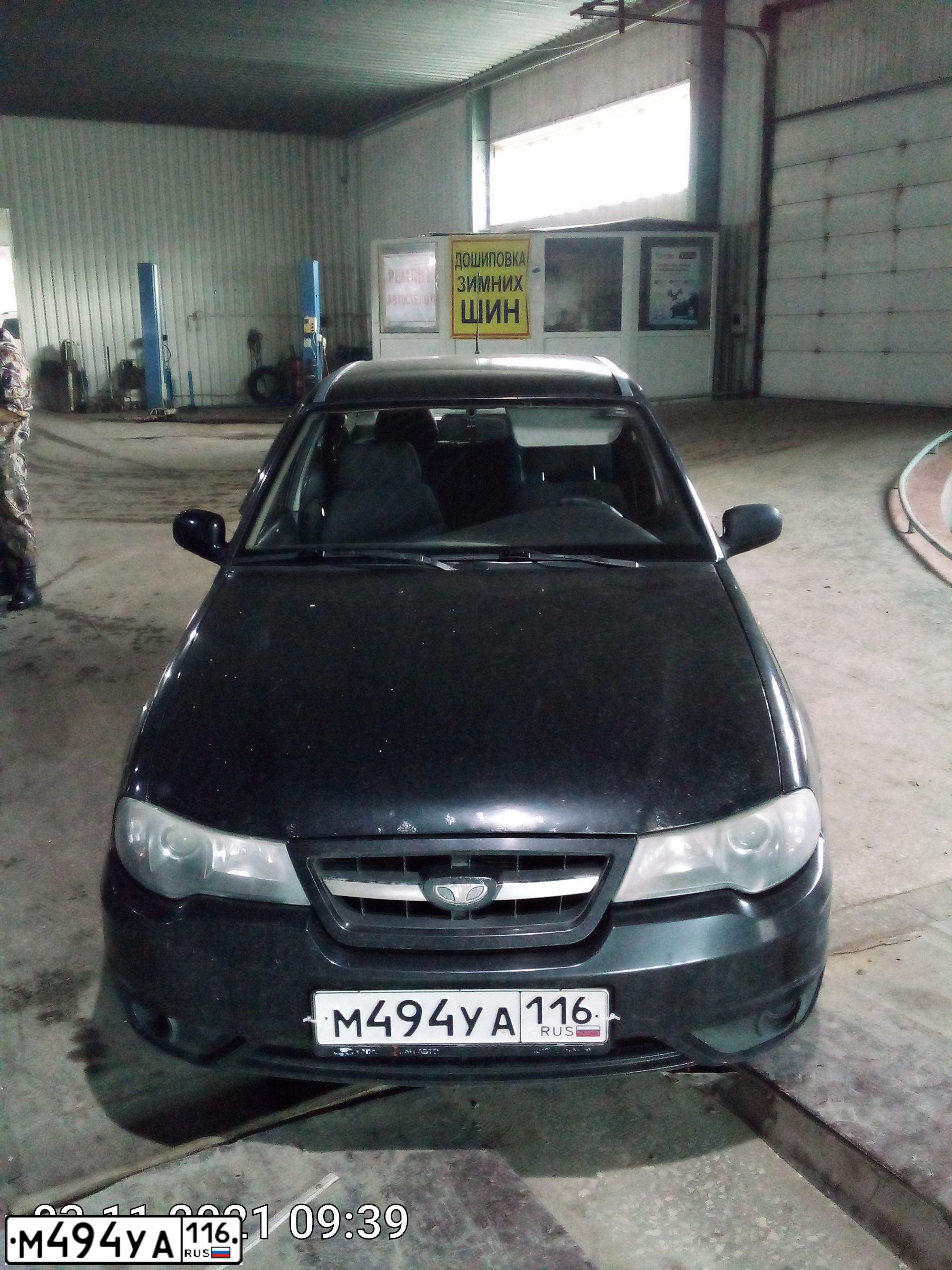 Фото автомобиля DAEWOO NEXIA, 2010 — госномер М494УА116. Цвет: БЛЕДНО-ЧЕРНЫЙ