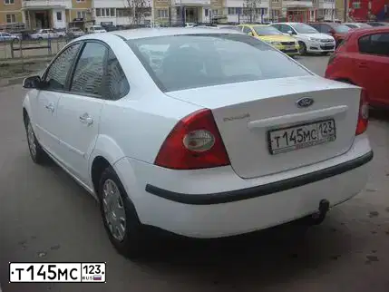 Фото автомобиля FORD D FOCUS, 2007 — госномер Т145МС123. Цвет: Белый