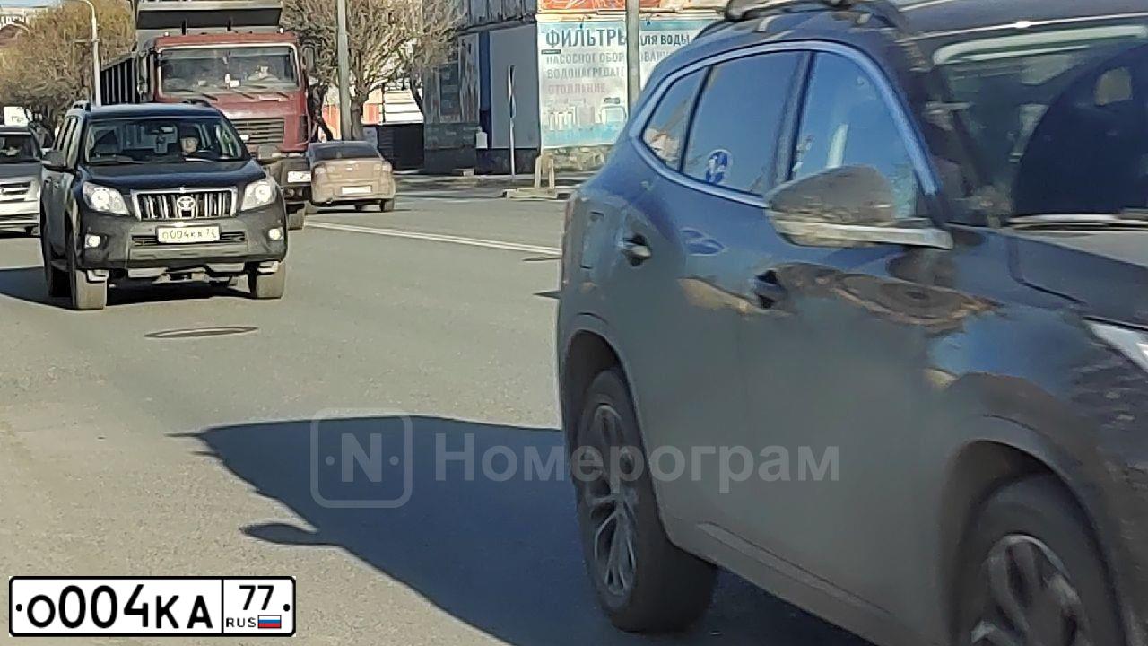 Фото автомобиля LADA 2109 SAMARA, 1994 — госномер О004КА77. Цвет: Красный