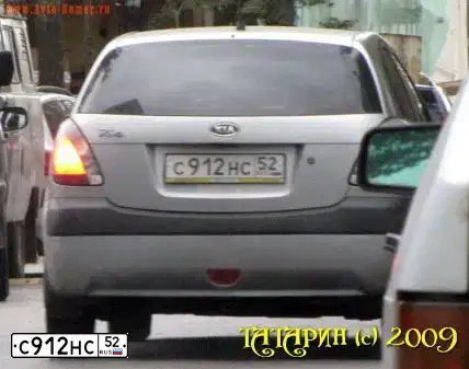Фото автомобиля KIA RIO, 2006 — госномер С912НС52. Цвет: СВЕТЛО-СЕРЫЙ