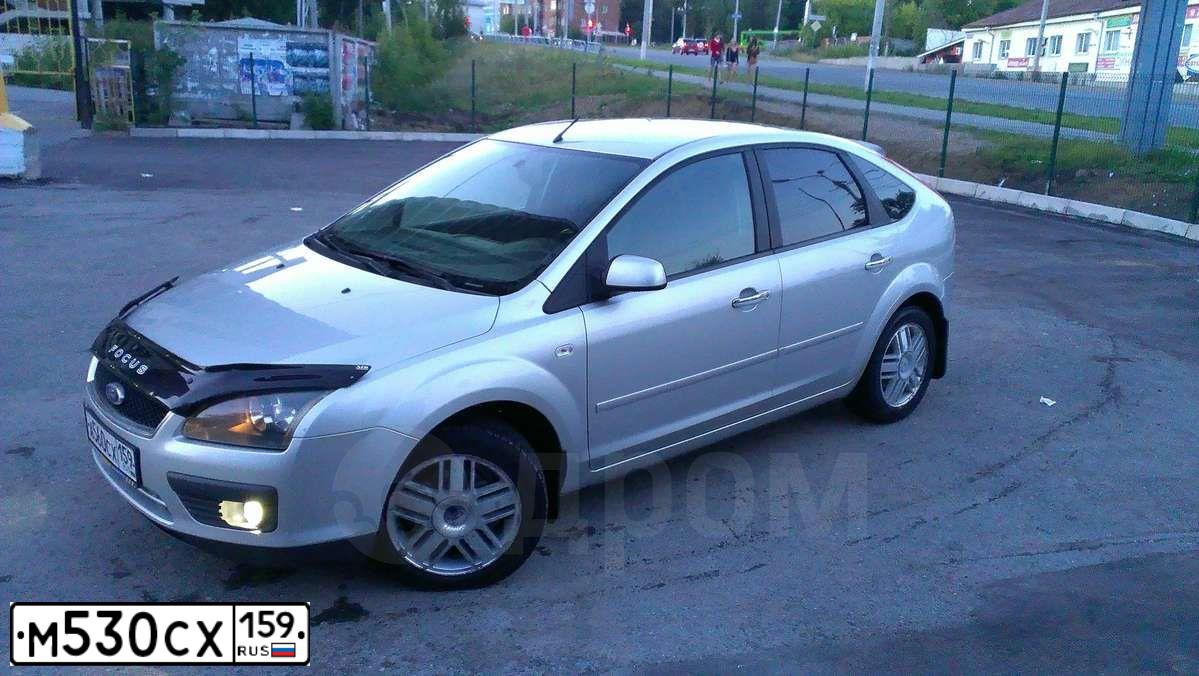 Фото автомобиля VOLKSWAGEN TRANSPORTER, 2006 — госномер Е368ТК86. Цвет: ЧЕРНЫЙ