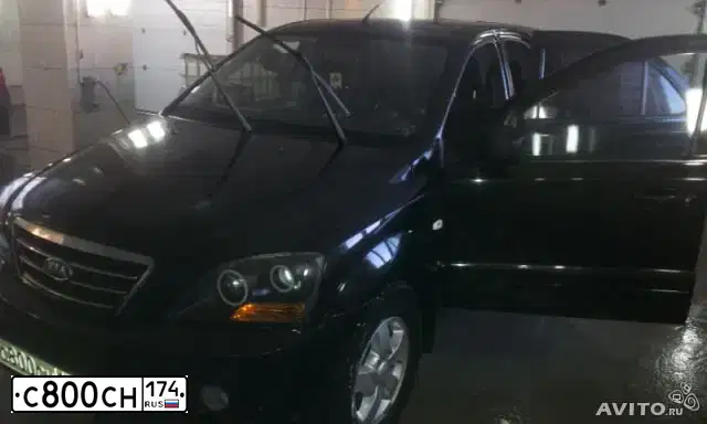 Фото автомобиля KIA SORENTO, 2007 — госномер Р374КХ174. Цвет: ЧЕРНЫЙ