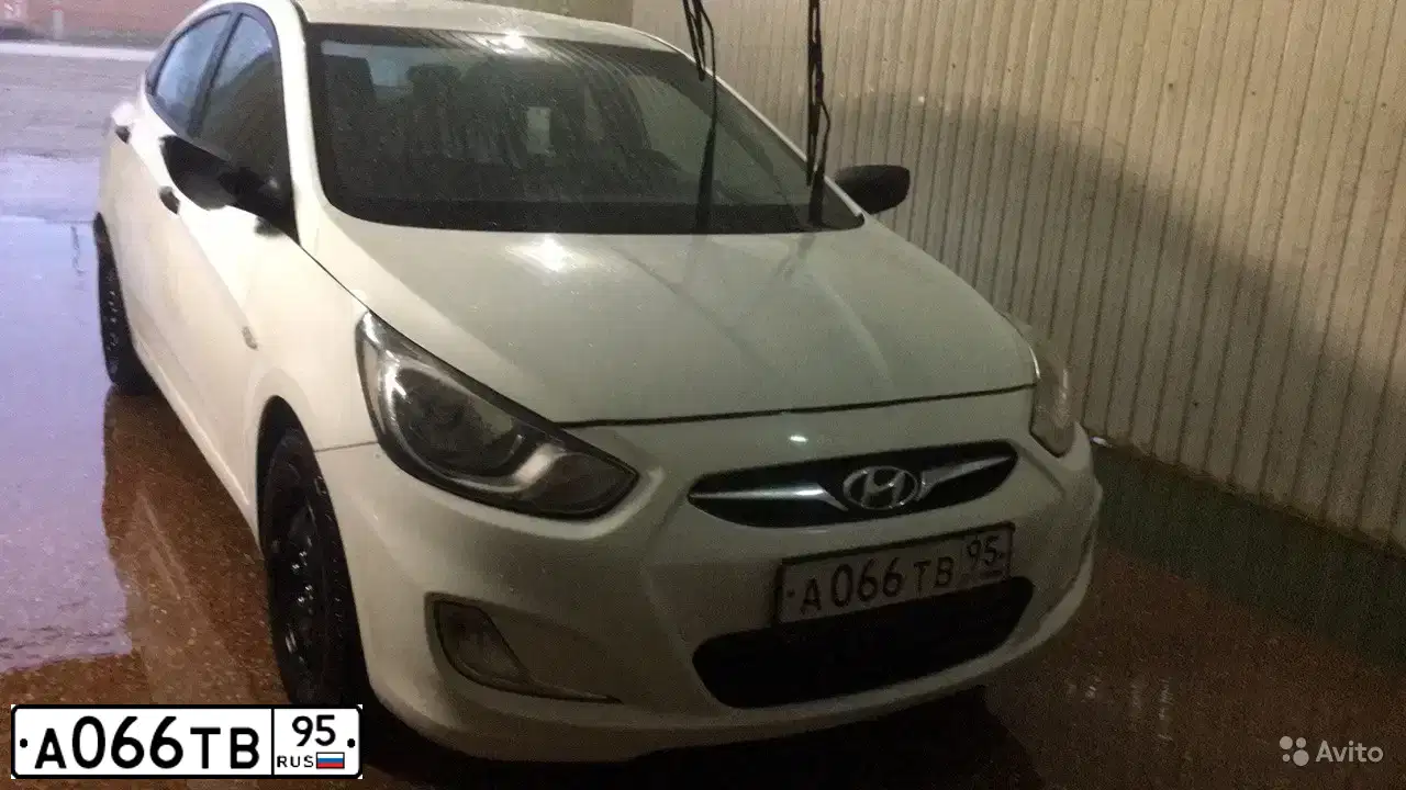 Фото автомобиля HYUNDAI SOLARIS, 2011 — госномер Р911НН05. Цвет: Белый