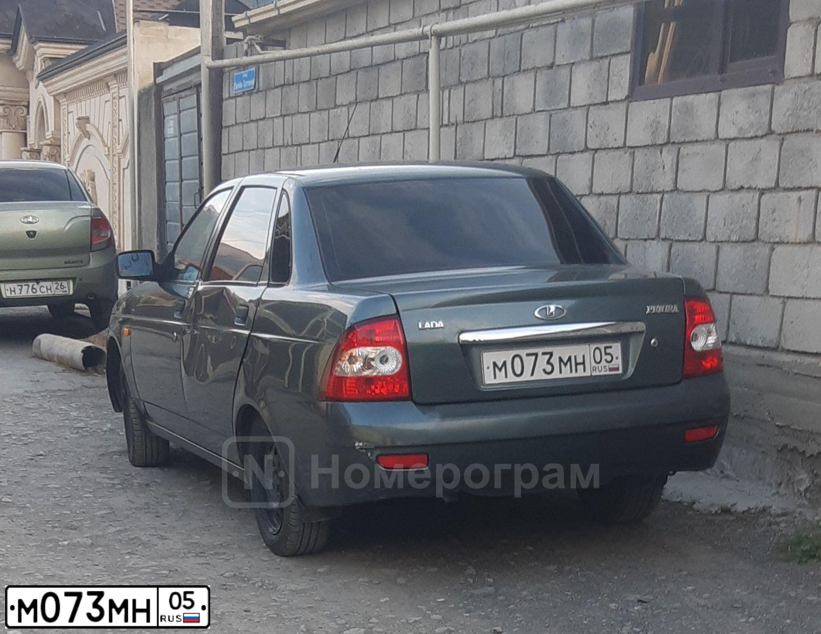 Фото автомобиля LADA 2170 PRIORA, 2011 — госномер М073МН05. Цвет: СЕРО-СИНЕ-ЗЕЛЕНЫЙ