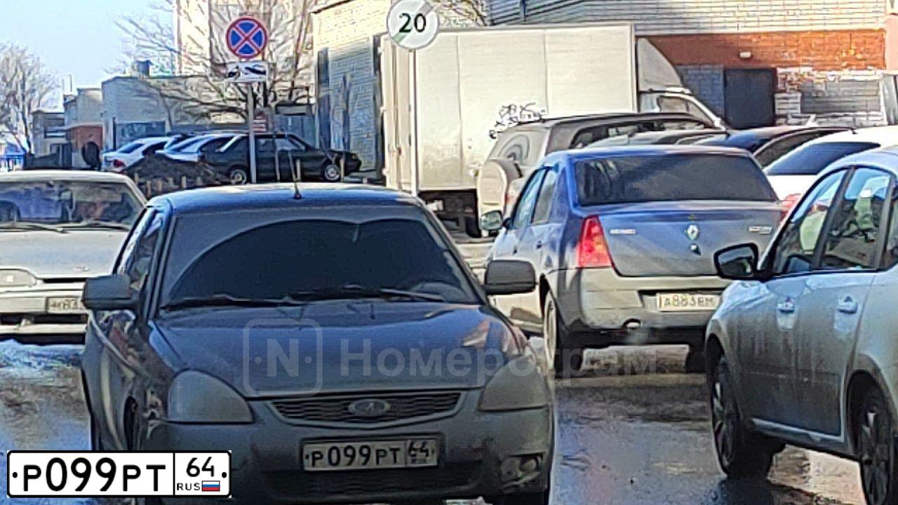 Фото автомобиля LADA 2170 PRIORA, 2013 — госномер Р099РТ64. Цвет: Сине-Черный