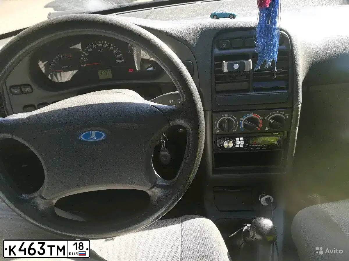 Фото автомобиля LADA 2112, 2007 — госномер Е389ХВ702. Цвет: СРЕДНИЙ СЕРО ЗЕЛ МЕТ