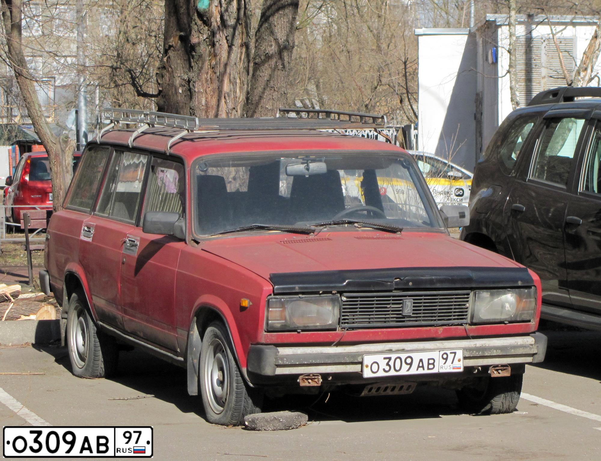 Фото автомобиля LADA 2104, 2000 — госномер О309АВ97. Цвет: Красный