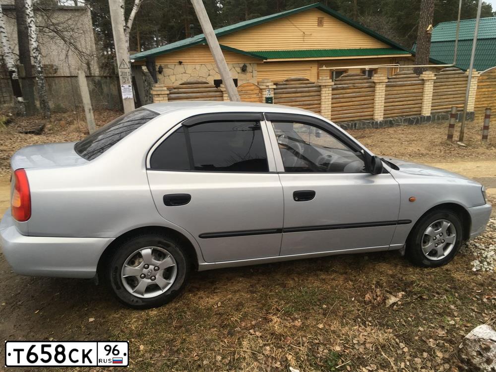 Фото автомобиля TAGAZ ACCENT, 2011 — госномер Т714СУ72. Цвет: Серебристый