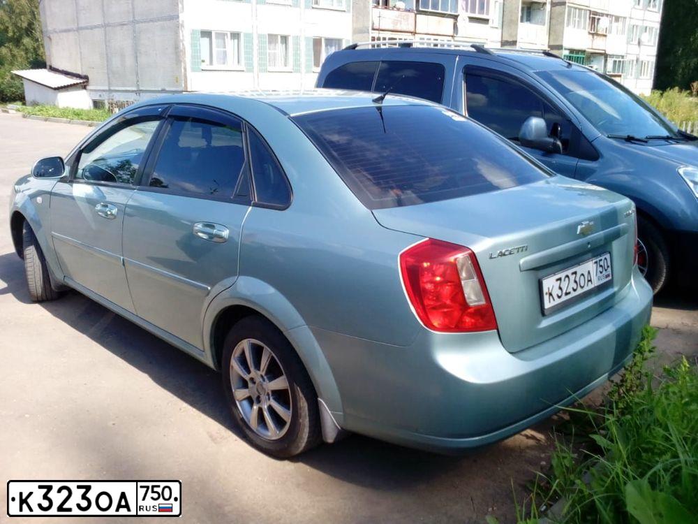 Фото автомобиля CHEVROLET LACETTI, 2006 — госномер К323ОА750. Цвет: ЗЕЛЕНЫЙ