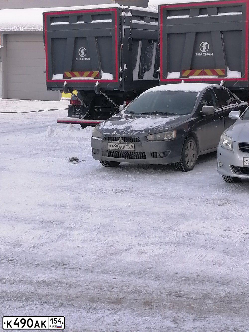 Фото автомобиля MITSUBISHI LANCER, 2008 — госномер Х114ОХ199. Цвет: СЕРЫЙ
