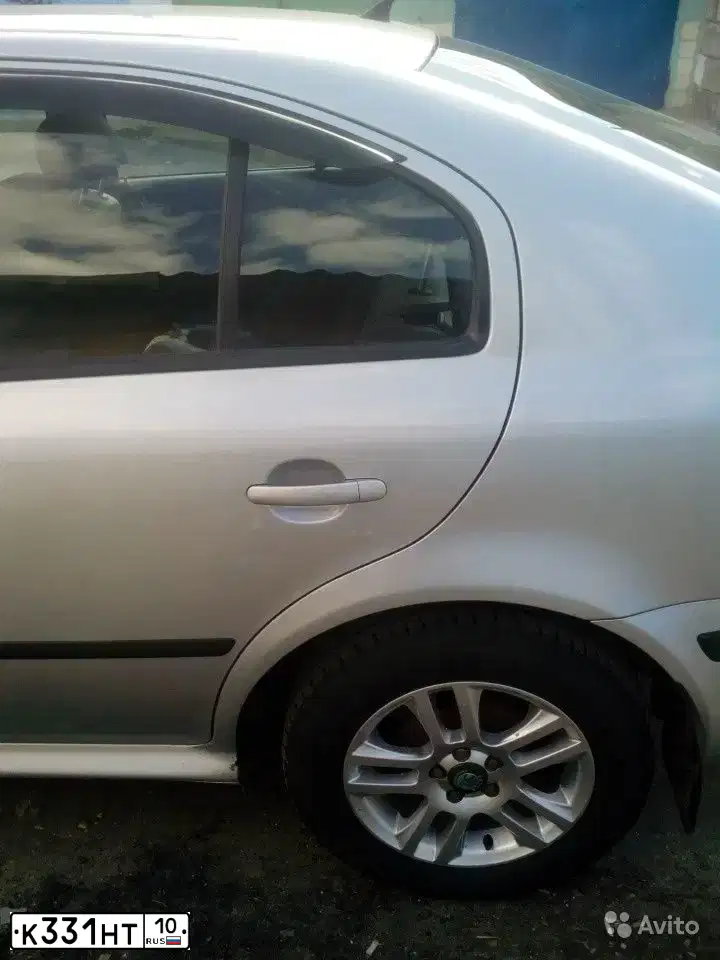 Фото автомобиля SKODA OCTAVIA, 2007 — госномер Н382УЕ46. Цвет: Серебристый