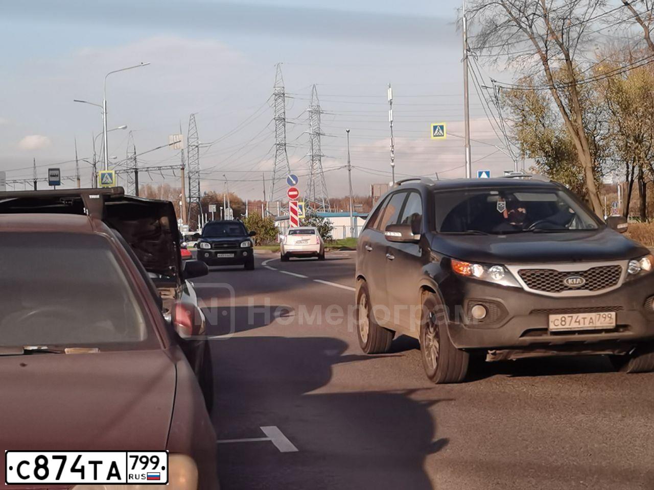 Фото автомобиля KIA SORENTO, 2010 — госномер Т583ЕК977. Цвет: ЧЕРНЫЙ