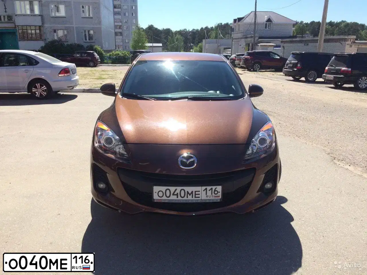 Фото автомобиля MAZDA 3, 2012 — госномер А715ТМ716. Цвет: КОРИЧНЕВЫЙ