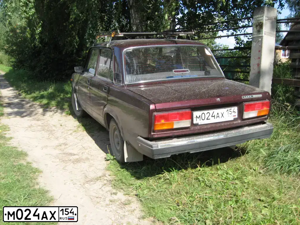 Фото автомобиля LADA 2107 LADA, 2011 — госномер М024АХ154. Цвет: ТЕМНО ВИШНЕВЫЙ