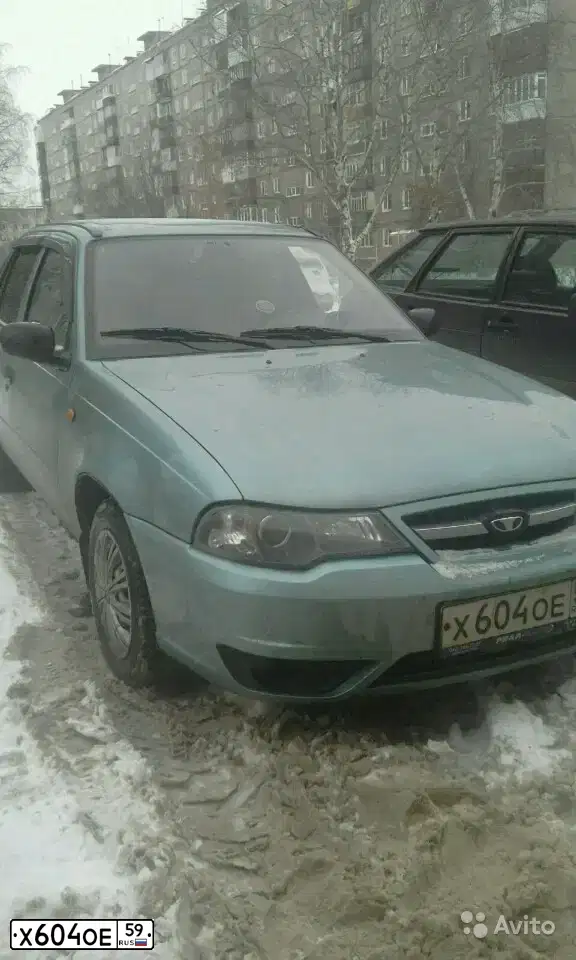 Фото автомобиля DAEWOO NEXIA, 2008 — госномер Х604ОЕ59. Цвет: СЕРО-ЗЕЛЕНЫЙ