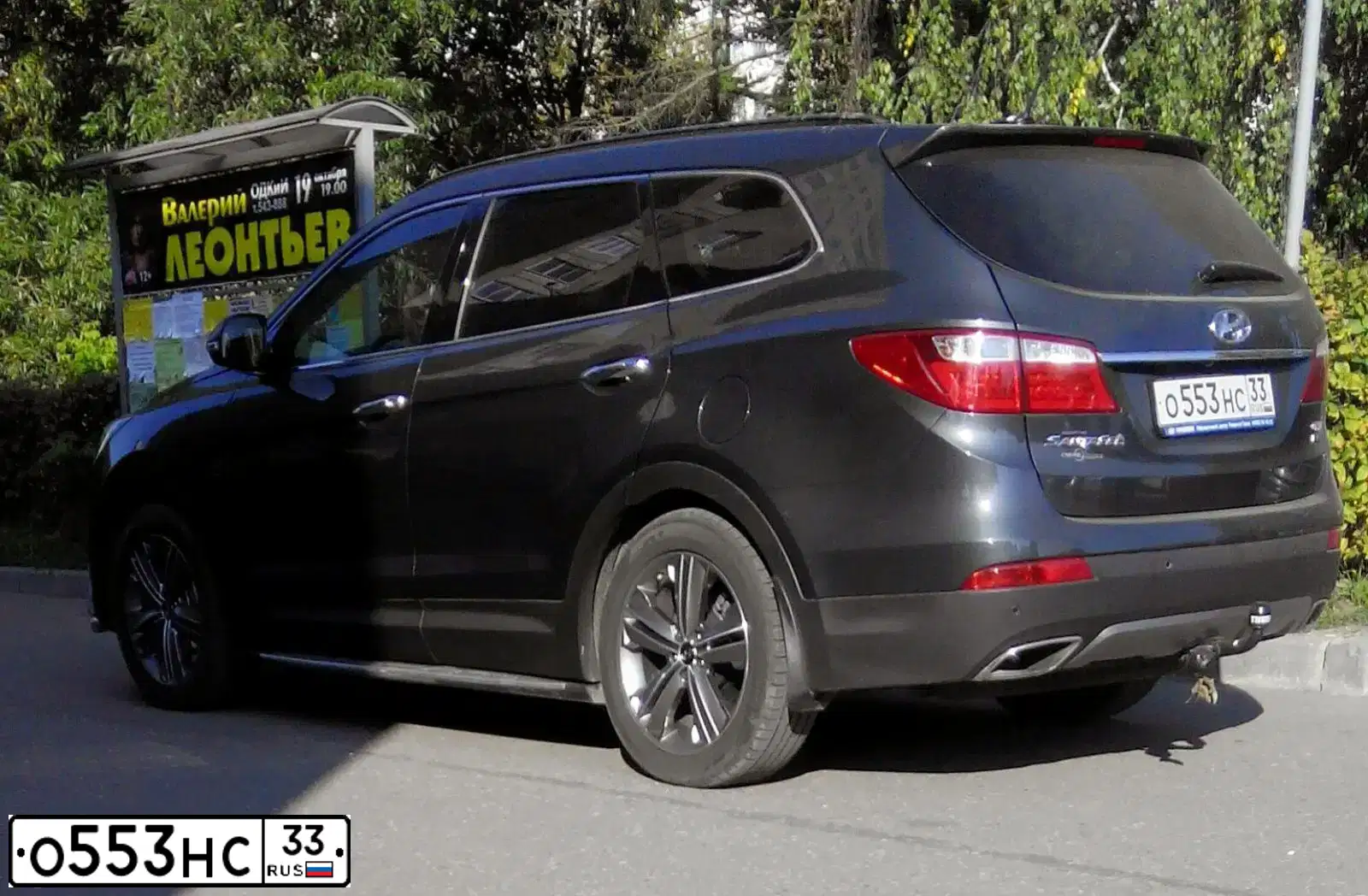 Фото автомобиля HYUNDAI SANTA FE, 2013 — госномер О874ВТ71. Цвет: ЧЕРНЫЙ