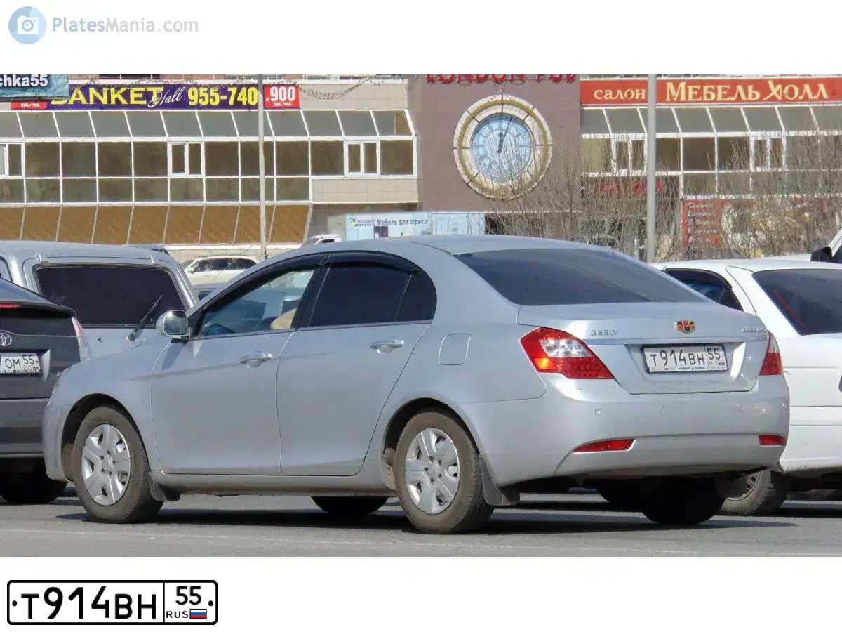 Фото автомобиля GEELY EMGRAND, 2013 — госномер А574АР155. Цвет: СЕРЕБРИСТЫЙ