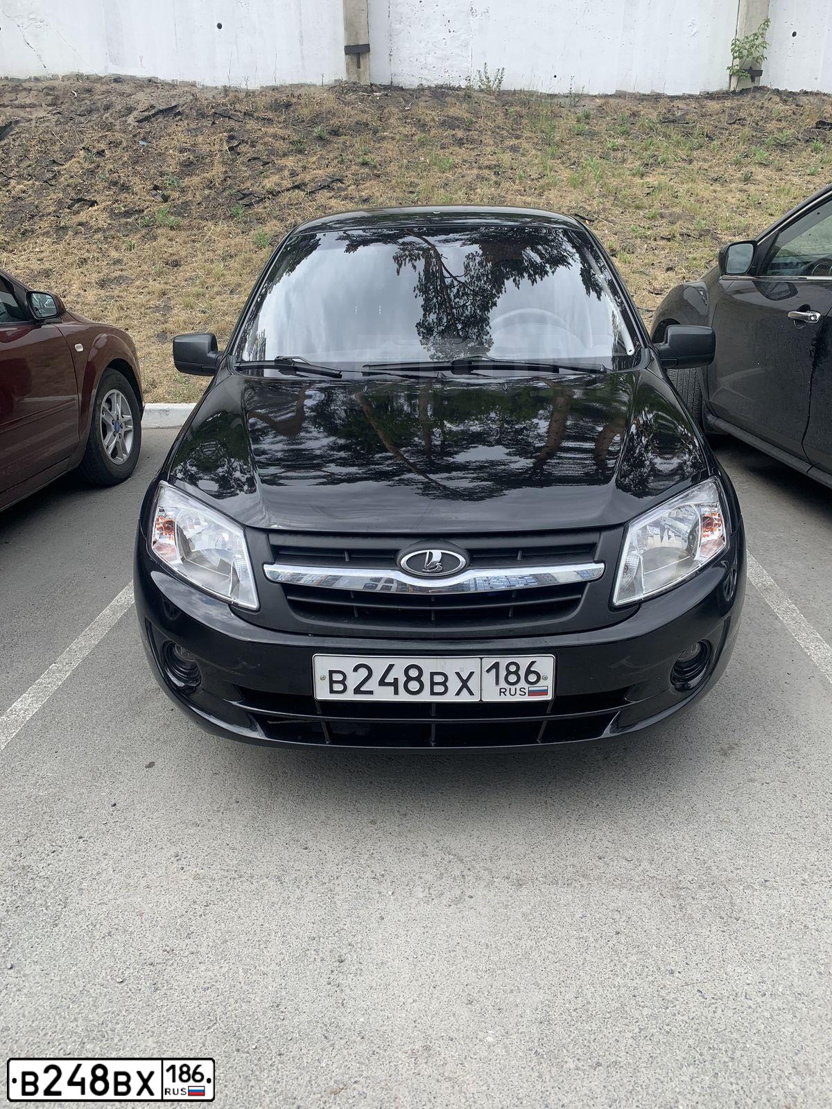 Фото автомобиля LADA 2190 GRANTA, 2014 — госномер В248ВХ186. Цвет: ЧЕРНЫЙ