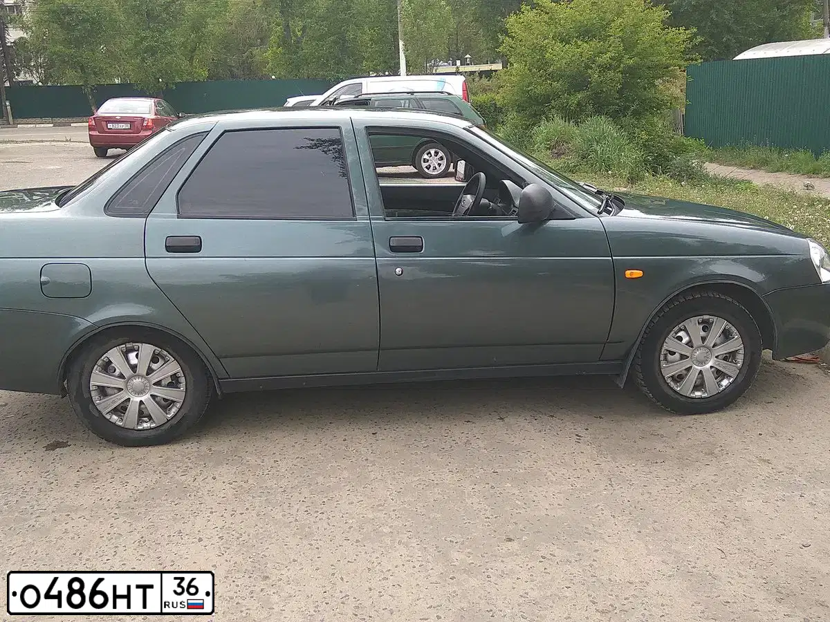 Фото автомобиля FORD FOCUS, 2007 — госномер Р468ВХ136. Цвет: КРАСНО-ОРАНЖЕВЫЙ